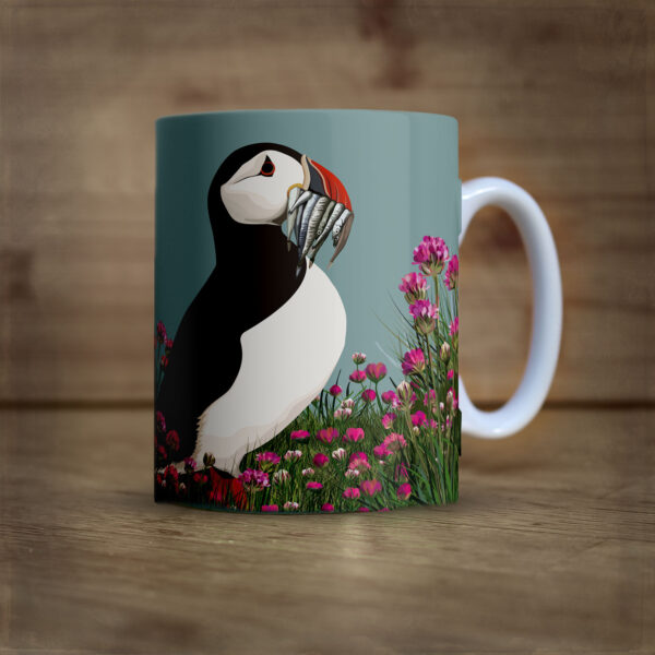 puffin and sea thrift mug by helen wyllie